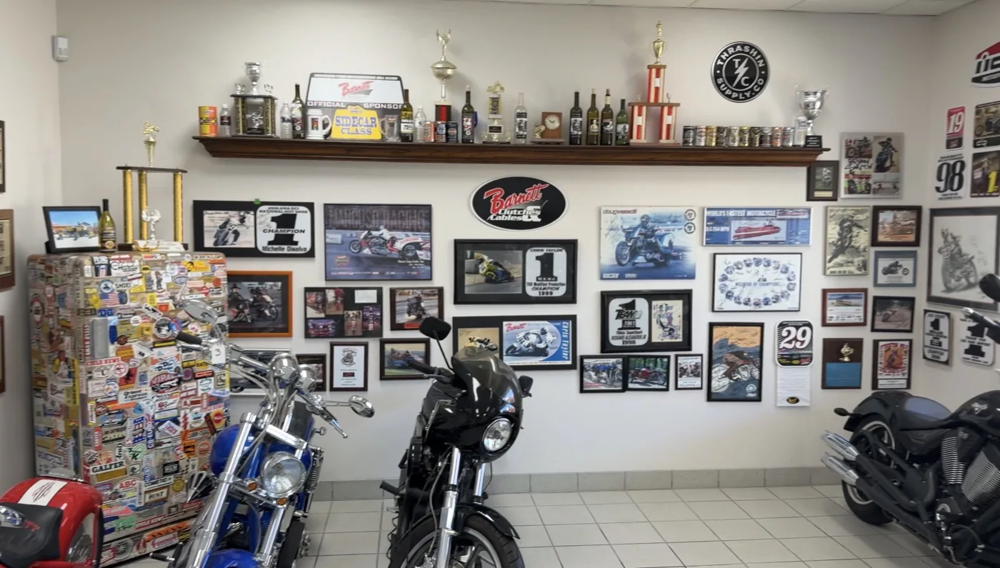 Trophy wall and race memorabilia inside the Barnett Clutches and Cables showroom in Ventura, California