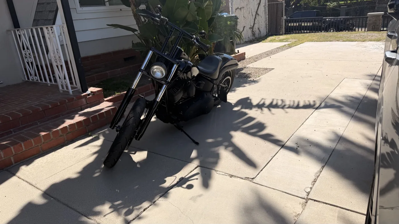 Johnny's used 2007 Harley-Davidson Night Train parked in a driveway on the day he bought it