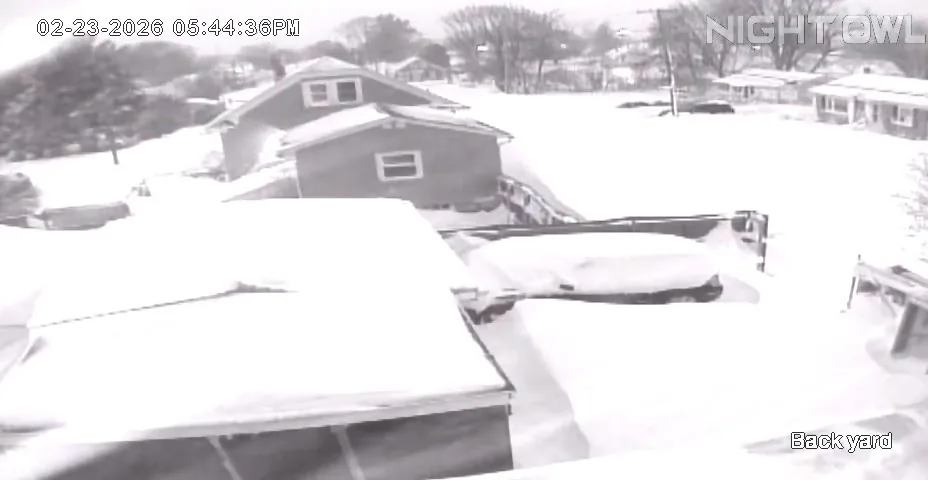 Security camera view of a Rhode Island backyard buried in snow, February 23, 2026
